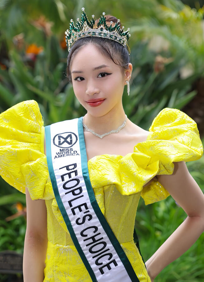 Angeli Chaves in yellow dress with crown and sash for Miss World America People’s Choice in LA, FAPCCA