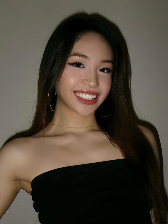 Smiling headshot of Angeli Chaves in black strapless top for Fil-Am Fashion Week