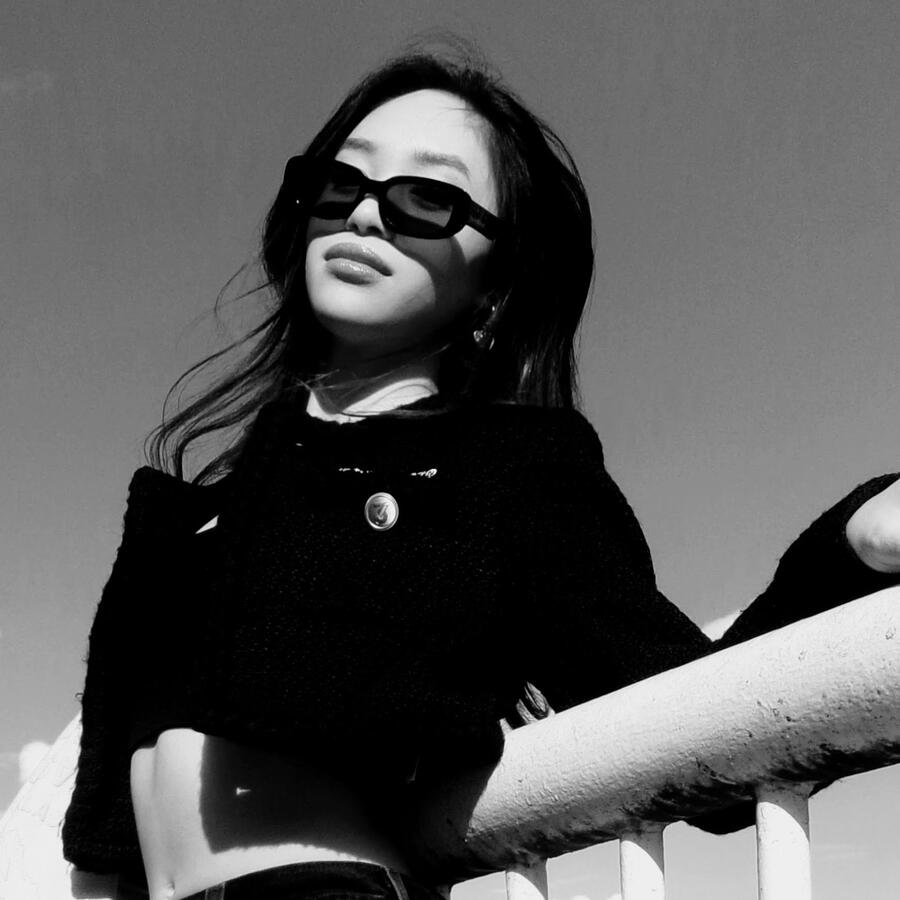 Editorial photo of Angeli Chaves in sunglasses and black coat in Vancouver, BC